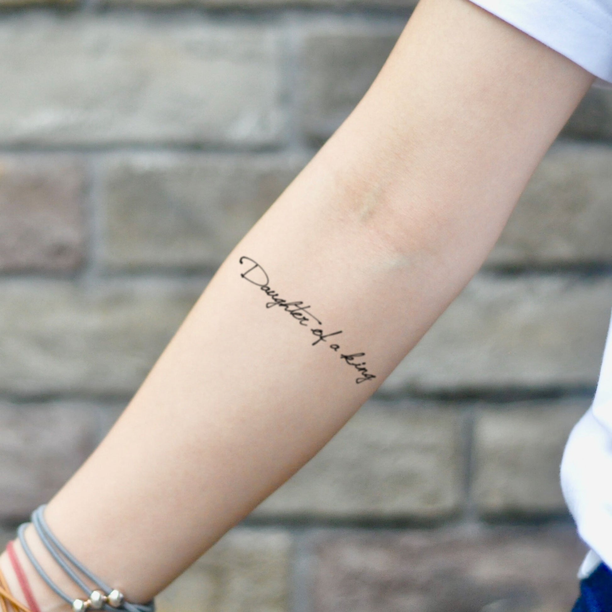 fake small daughter of the king Lettering temporary tattoo sticker design idea on inner arm