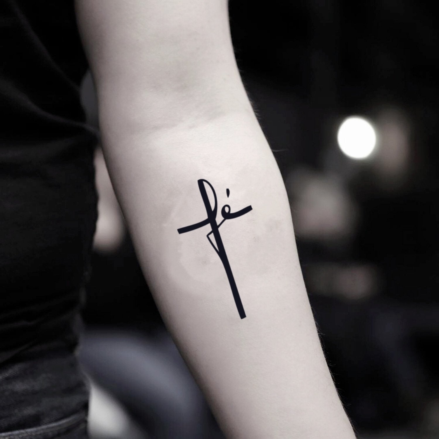 fake small fe cross minimalist temporary tattoo sticker design idea on inner arm