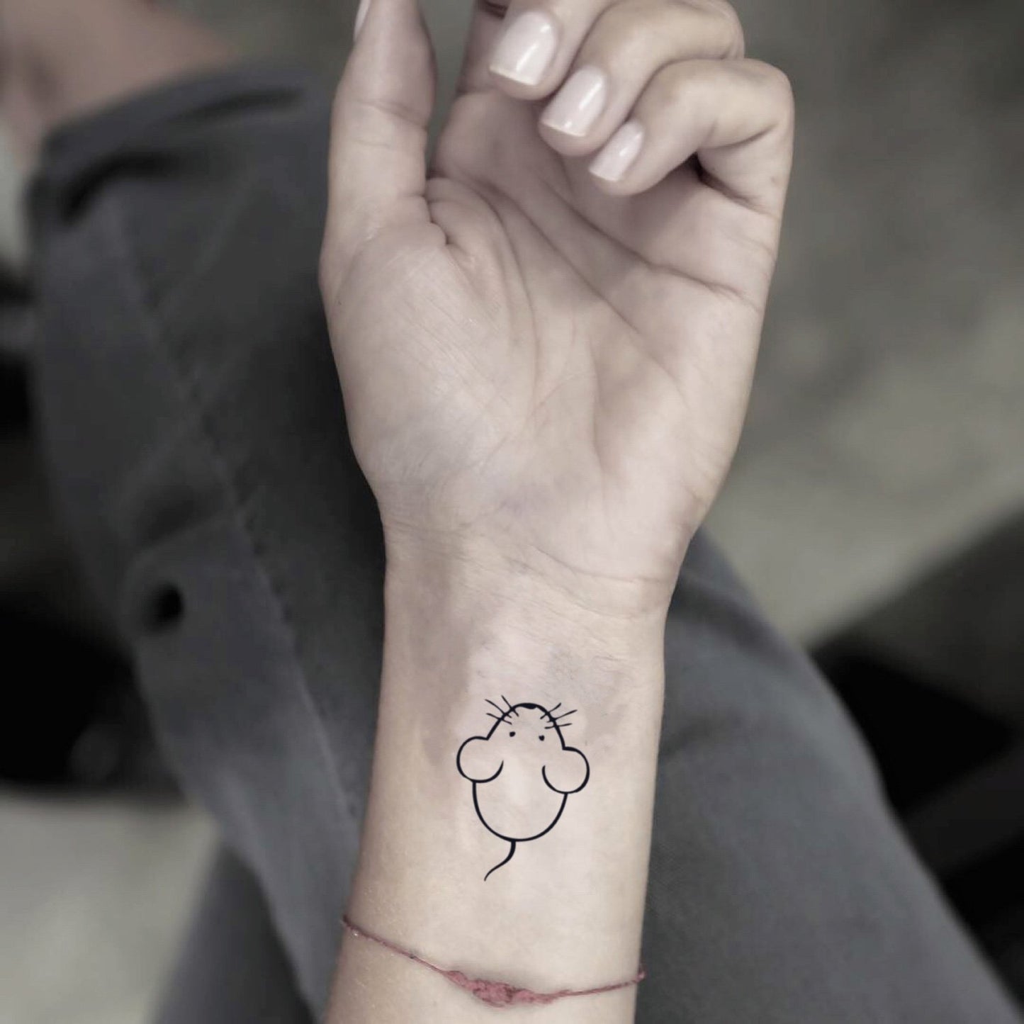 fake small mouse animal temporary tattoo sticker design idea on wrist